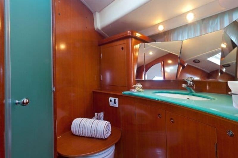 a bathroom with a sink and a toilet aboard CAPRICE Yacht for Charter