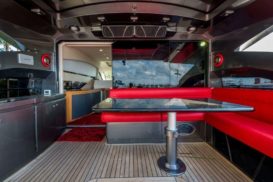 a car with a pool table aboard TICUN Yacht for Charter