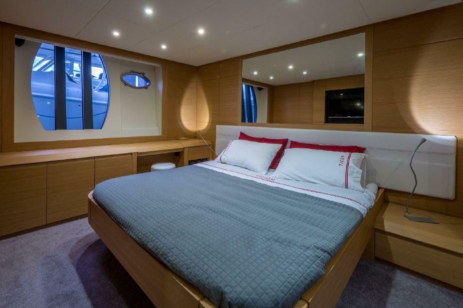 a bed in a room aboard TICUN Yacht for Charter