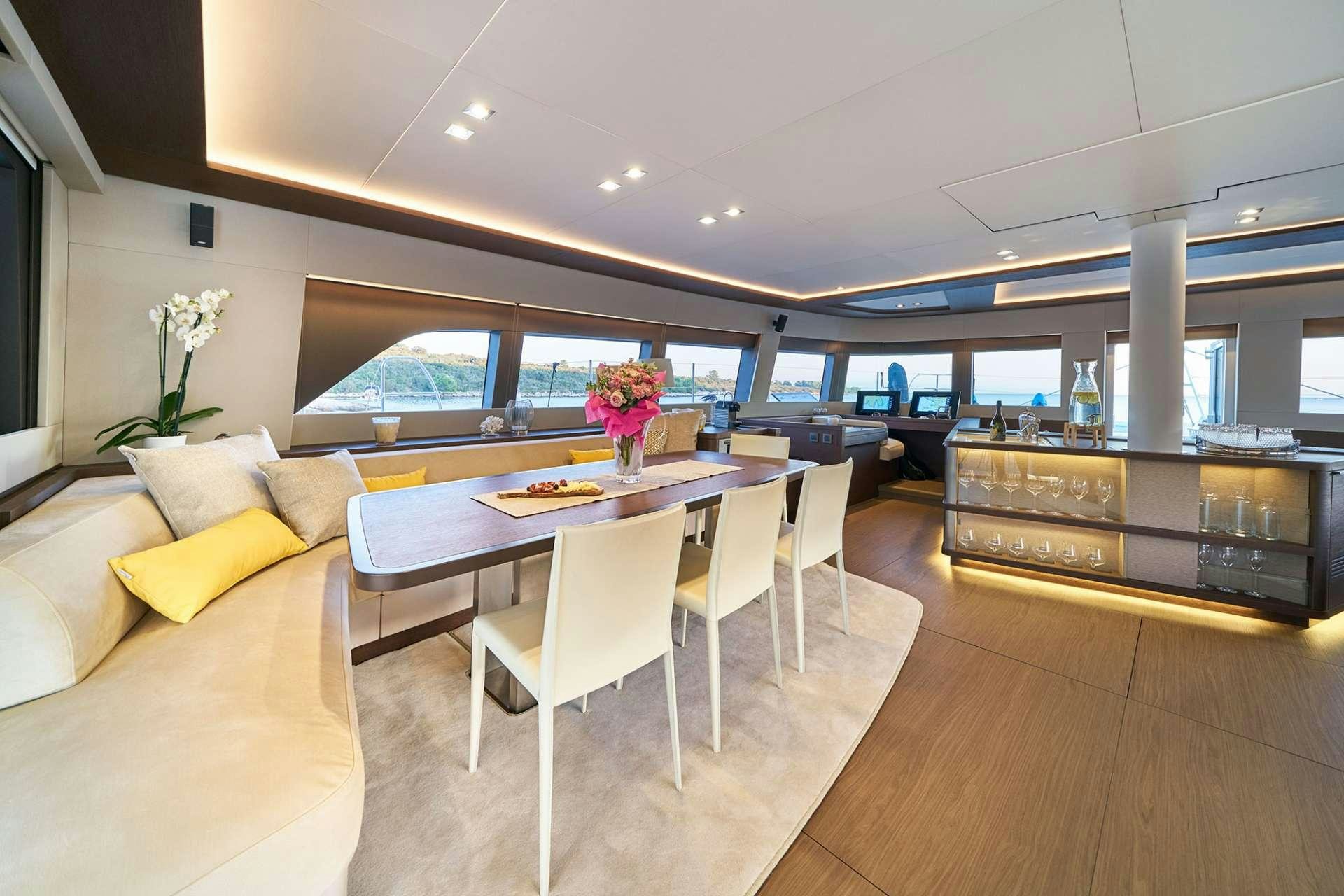 a kitchen and dining area aboard ADRIATIC DRAGON Yacht for Charter