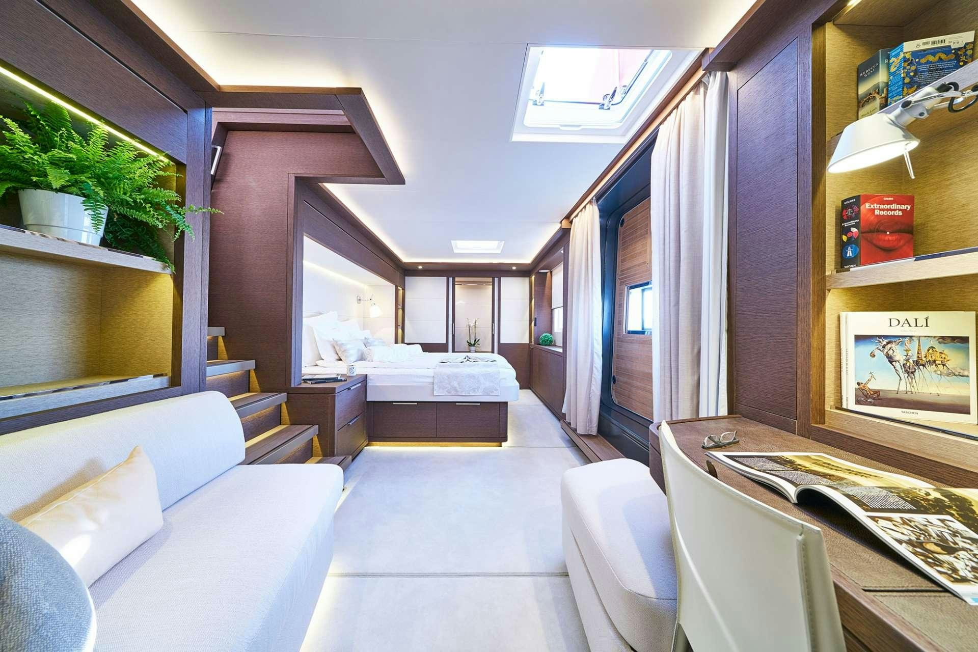 a living room with a couch and a table aboard ADRIATIC DRAGON Yacht for Charter