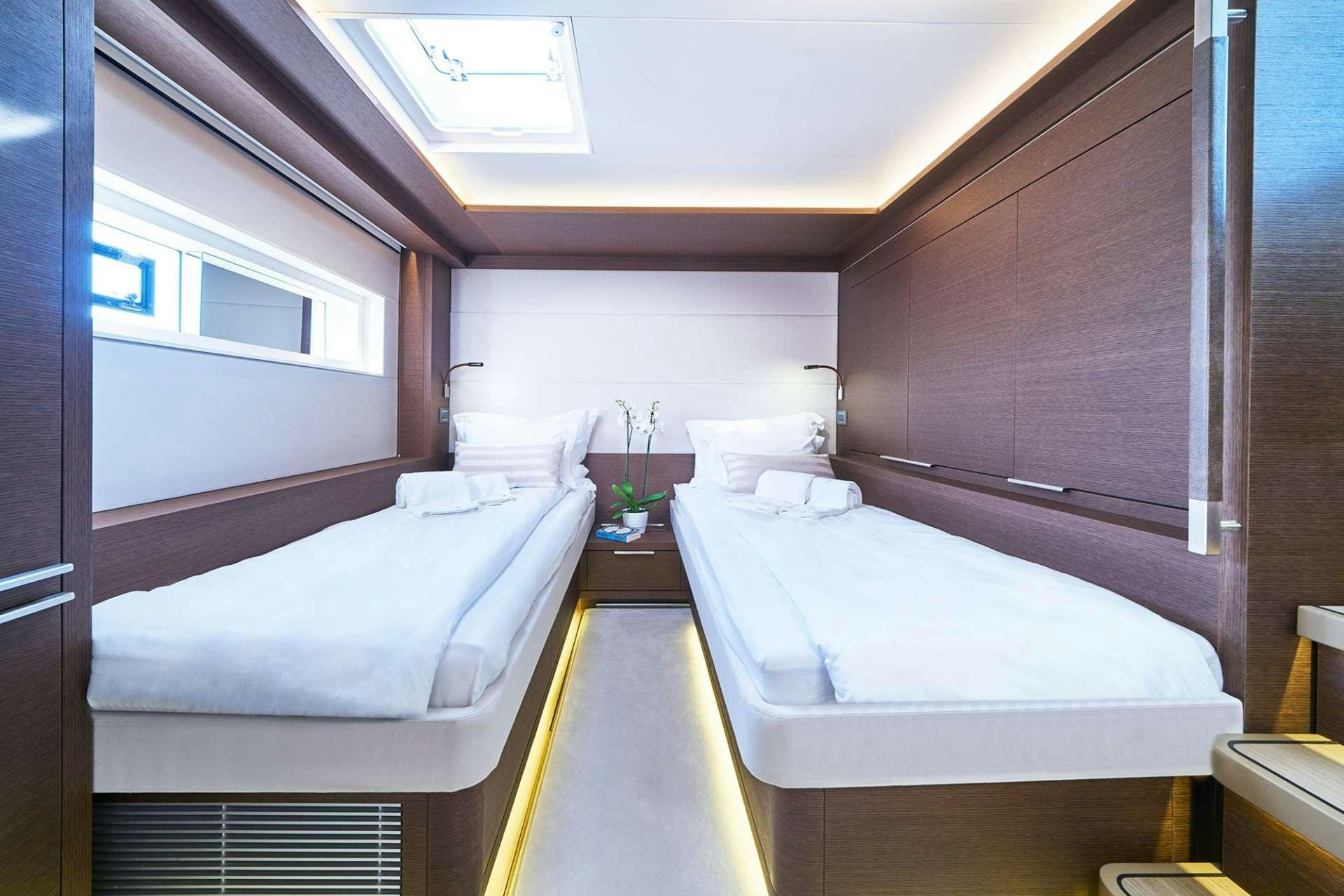 a room with two beds aboard ADRIATIC DRAGON Yacht for Charter