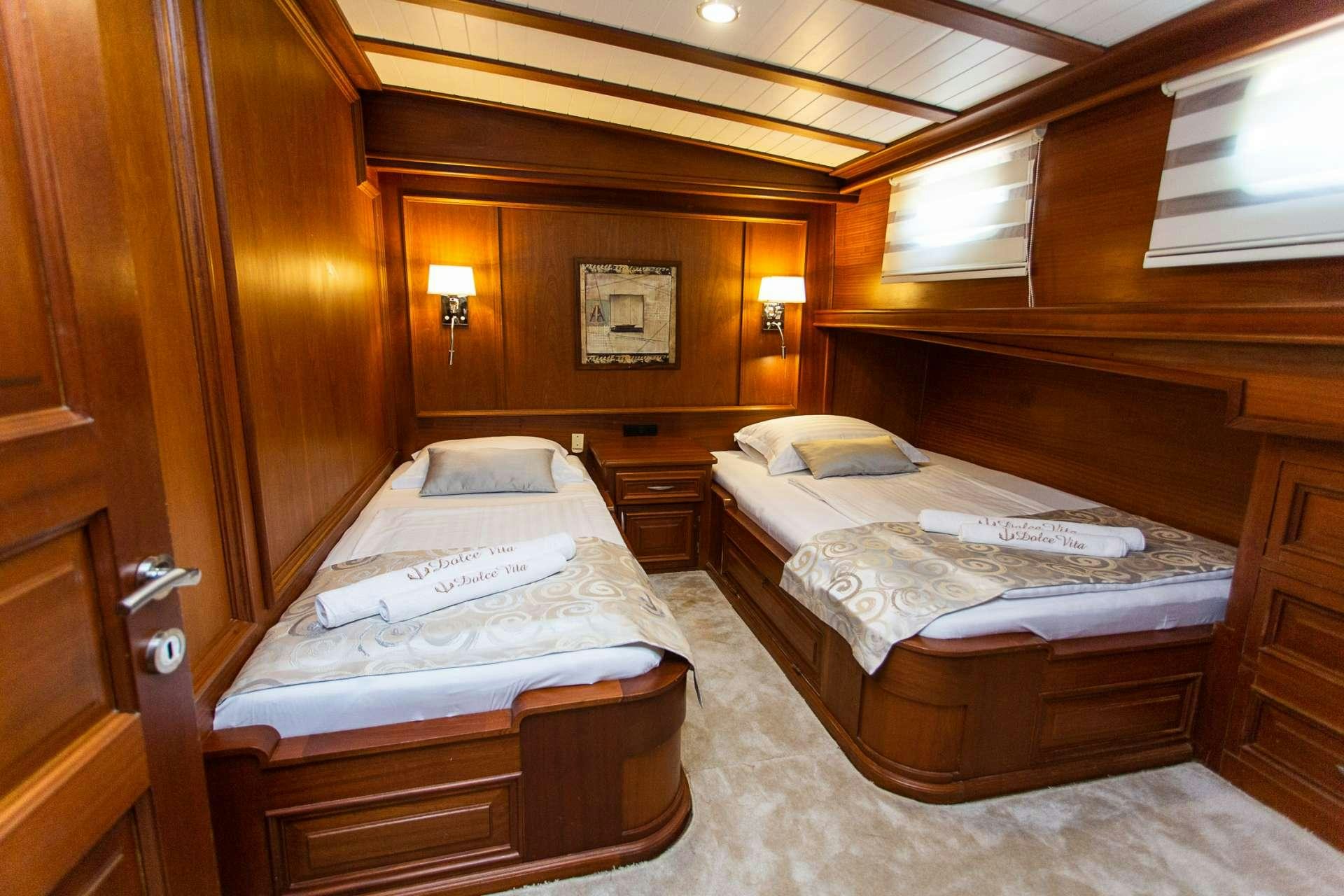 a room with wooden walls aboard DOLCE VITA Yacht for Charter