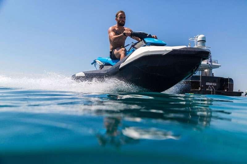 a man on a jet ski aboard HEESEN Yacht for Charter