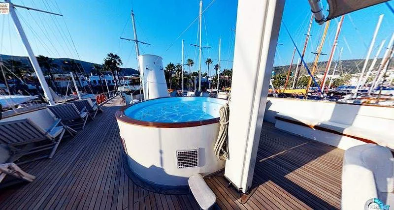 a boat on a dock aboard ELARA 1 Yacht for Charter