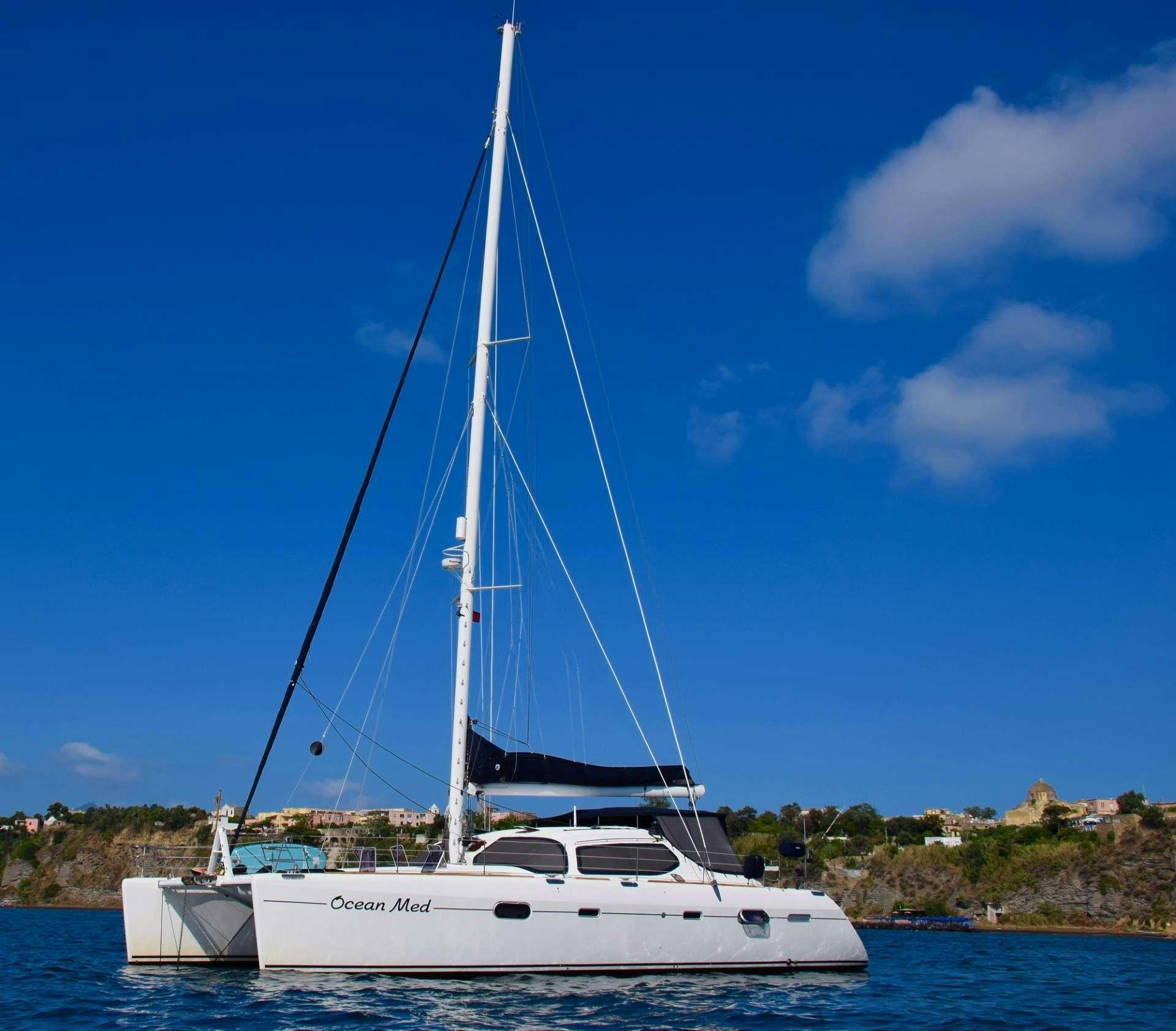 a sailboat on the water aboard OCEAN MED Yacht for Charter