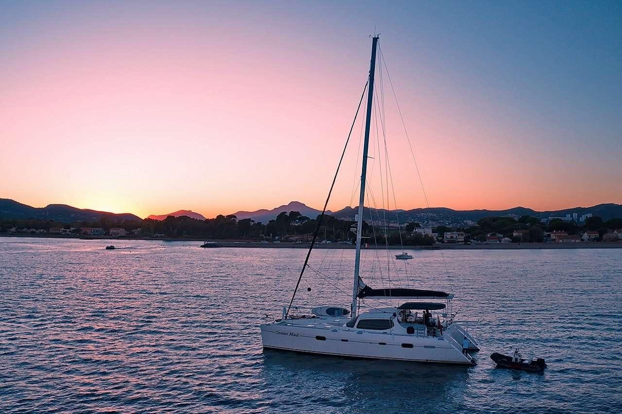 a sailboat in the water aboard OCEAN MED Yacht for Charter