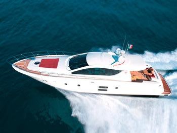a white boat in the water aboard SAURON Yacht for Charter