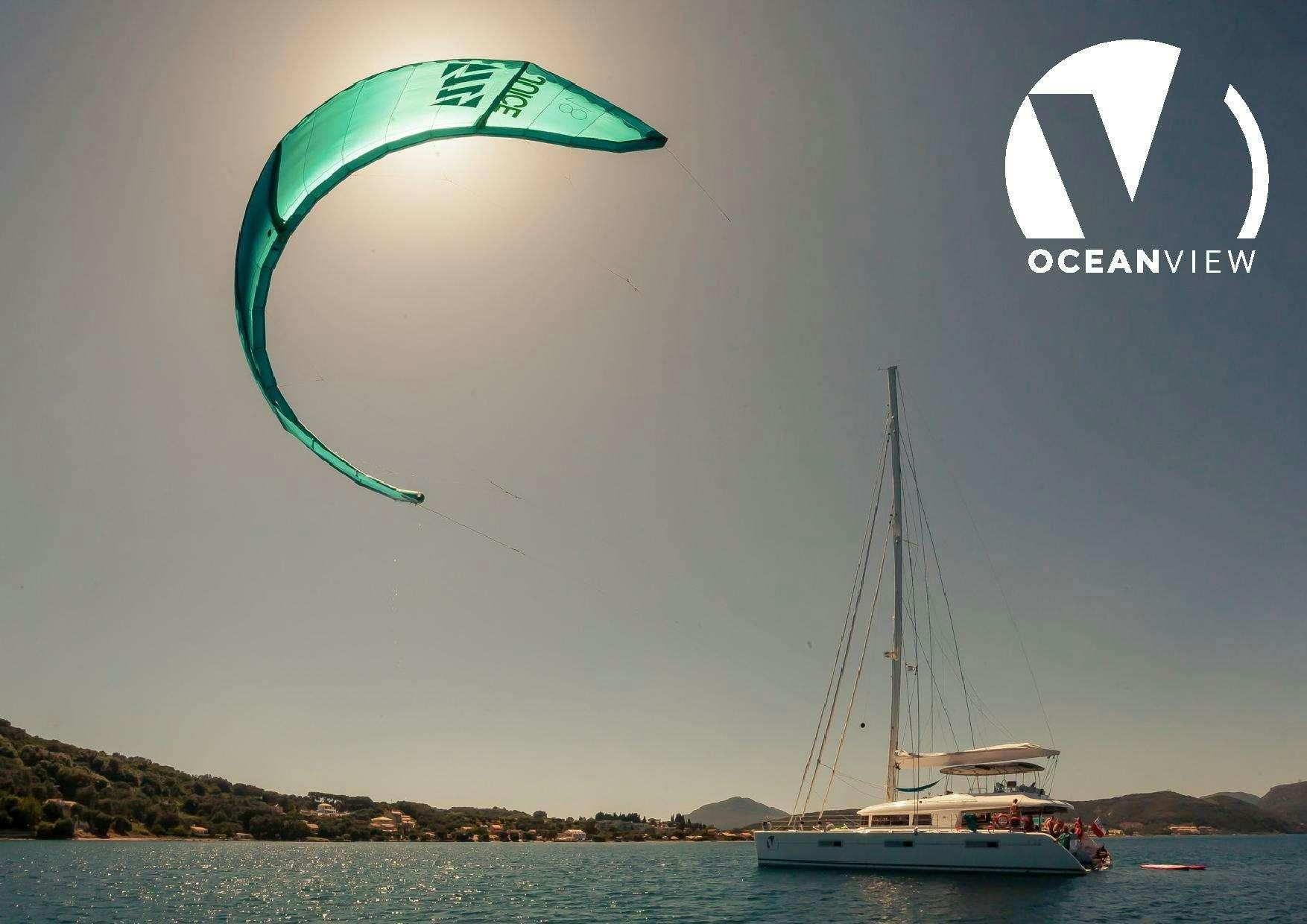 a sailboat in the water aboard OCEAN VIEW Yacht for Charter