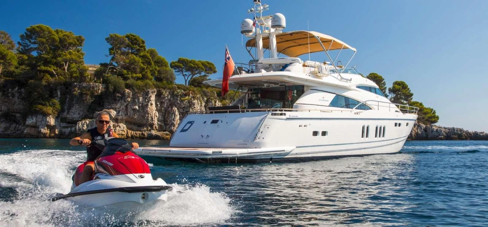 a person on a boat with a sail aboard D5 Yacht for Charter