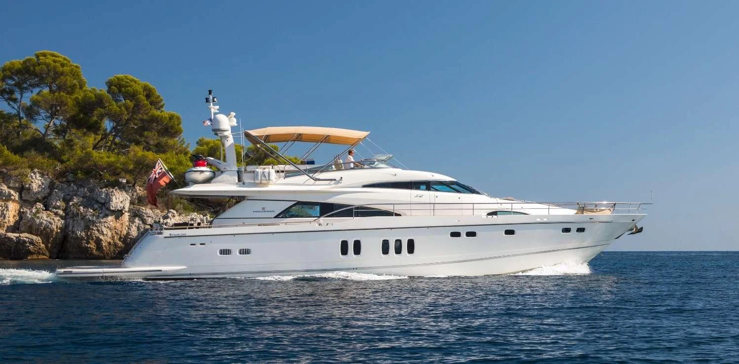 a white yacht on the water aboard D5 Yacht for Charter