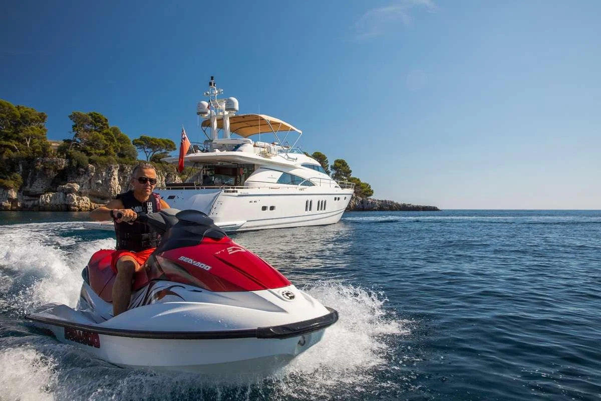 a man on a boat aboard D5 Yacht for Charter