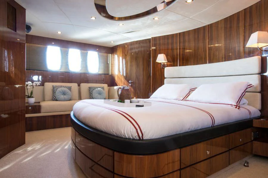 a bed in a room aboard D5 Yacht for Charter