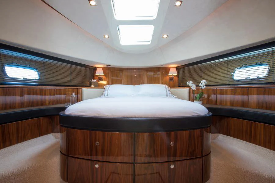 a bed in a room aboard D5 Yacht for Charter