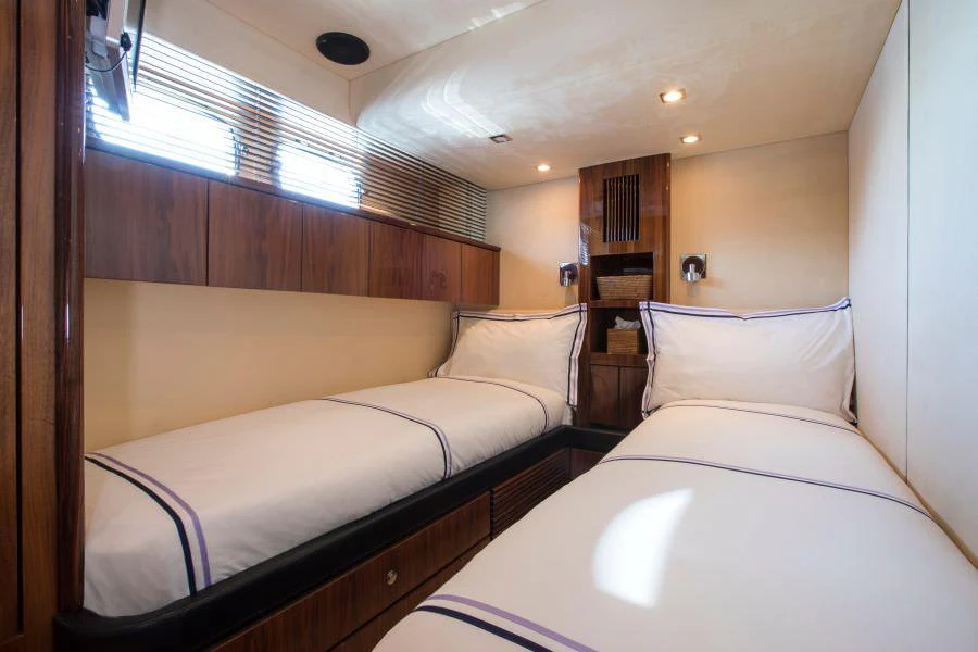 a room with two beds aboard D5 Yacht for Charter