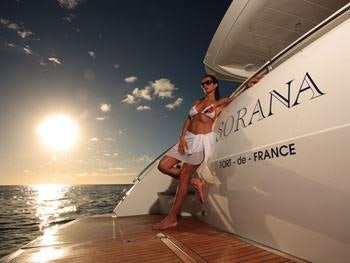 a man sitting on a boat aboard SORANA Yacht for Charter
