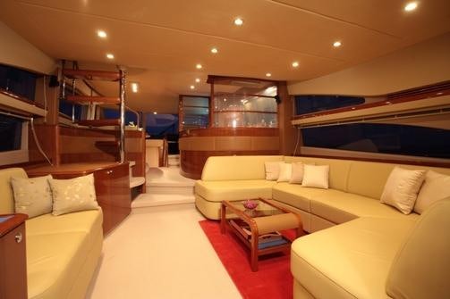 a living room with a large mirror aboard SORANA Yacht for Charter