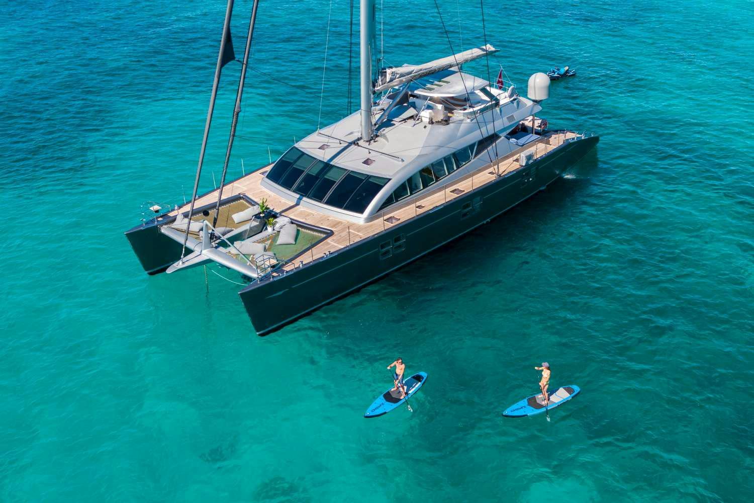 a boat with people on it aboard CARTOUCHE Yacht for Charter