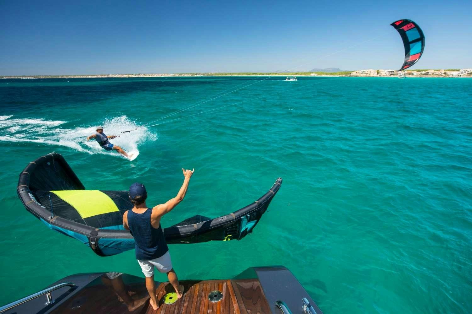 a man on a jet ski aboard CARTOUCHE Yacht for Charter