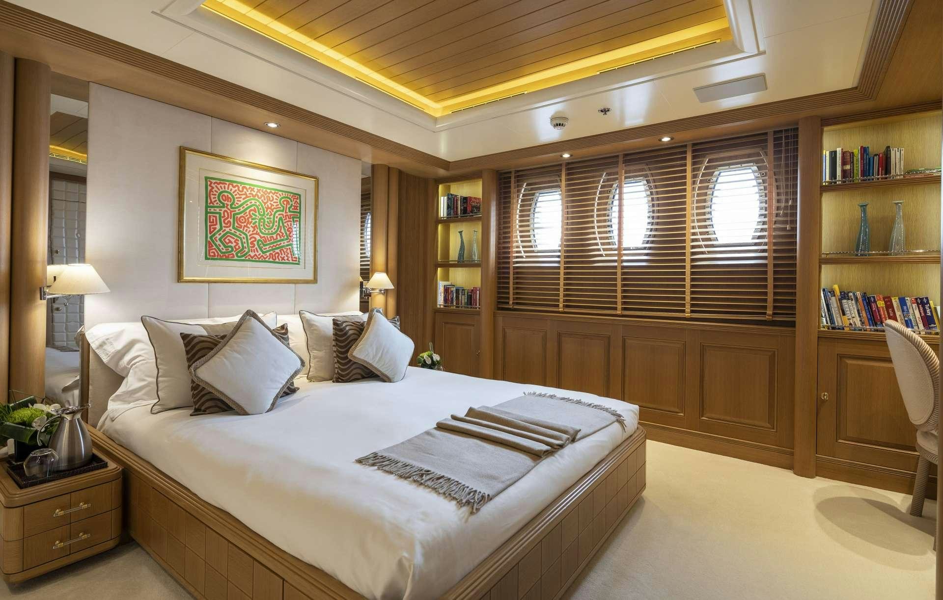 a bed in a room aboard MARLA Yacht for Charter