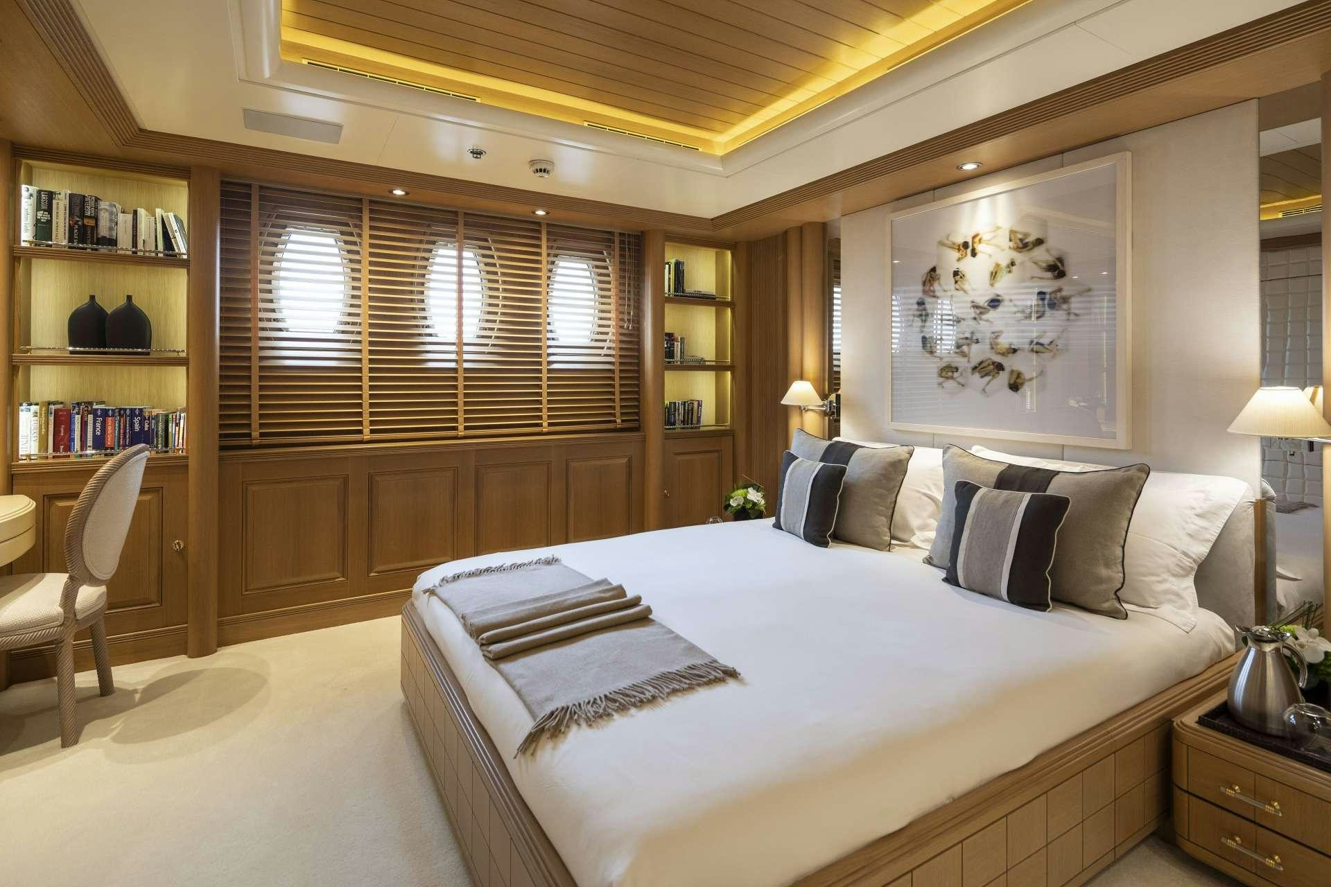 a large bed in a room aboard MARLA Yacht for Charter