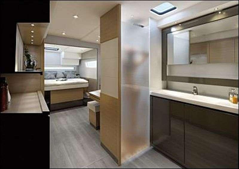 a bathroom with a large mirror aboard Ghost Yacht for Charter