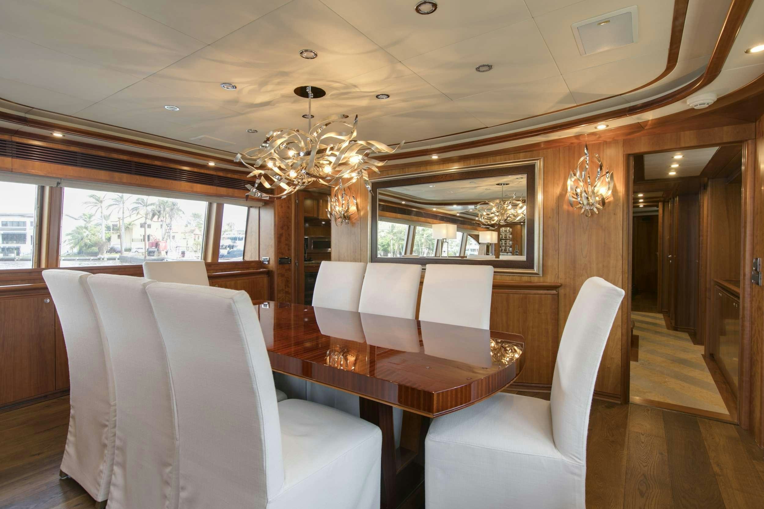a fancy looking living room aboard MAMBO Yacht for Charter