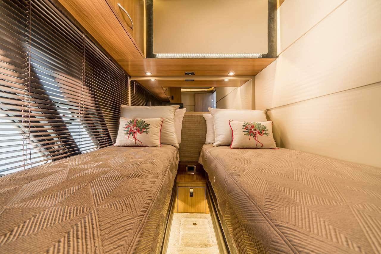 a couple of beds in a room aboard KRAKEN Yacht for Charter