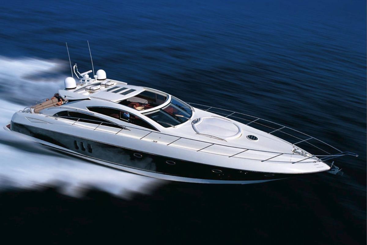 a white yacht on the water aboard ASPIRE OF LONDON Yacht for Charter