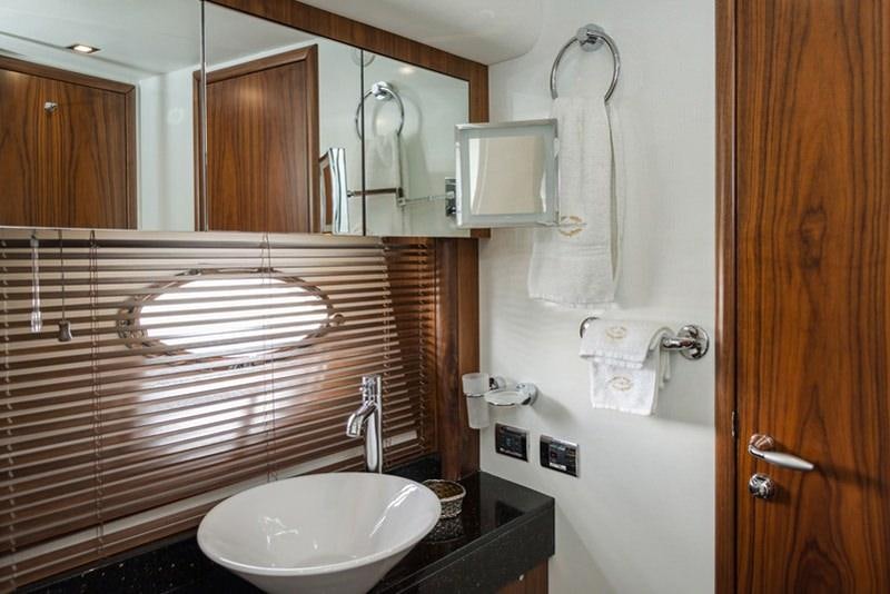 a bathroom with a sink and a bathtub aboard ASPIRE OF LONDON Yacht for Charter