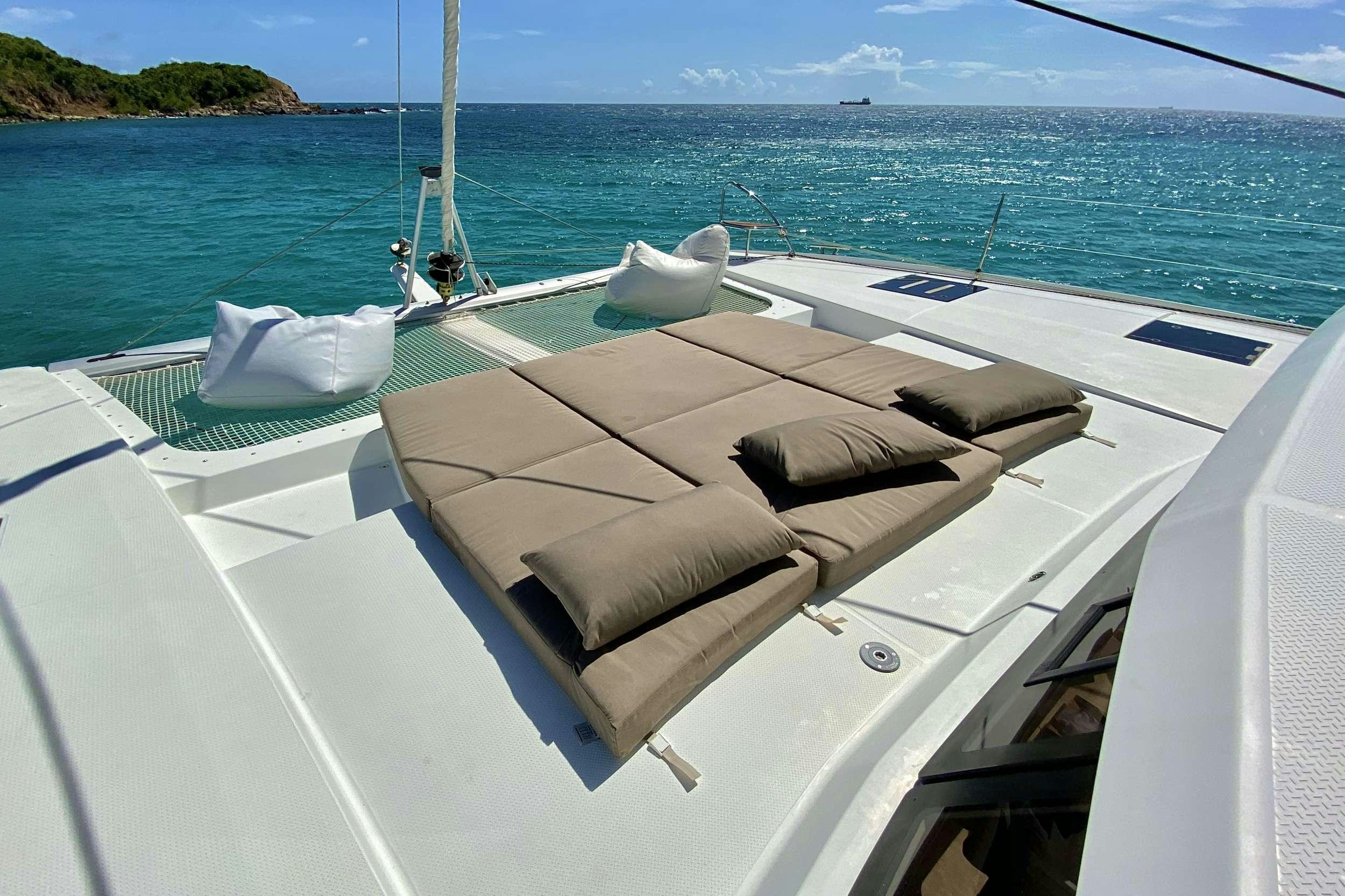 a boat on the water aboard BLACK TORTUGA Yacht for Charter
