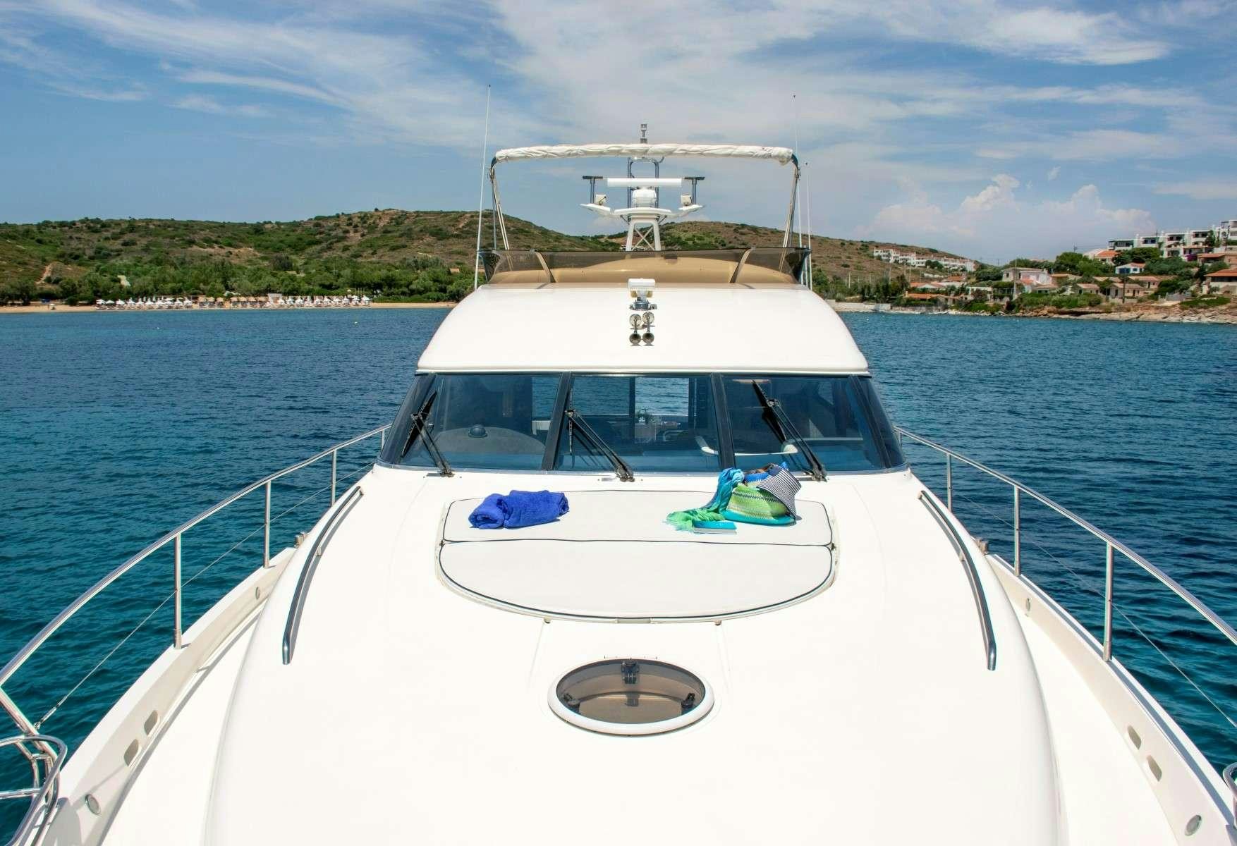a white boat in the water aboard FAST BREAK Yacht for Charter