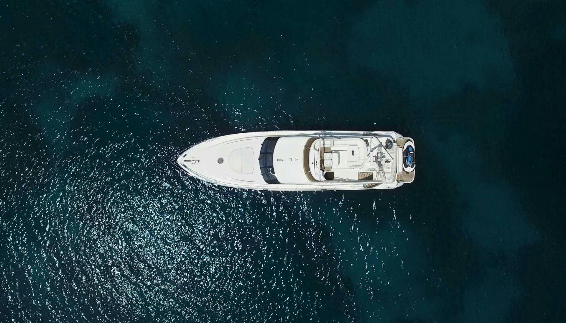 a silver car in the water aboard FAST BREAK Yacht for Charter