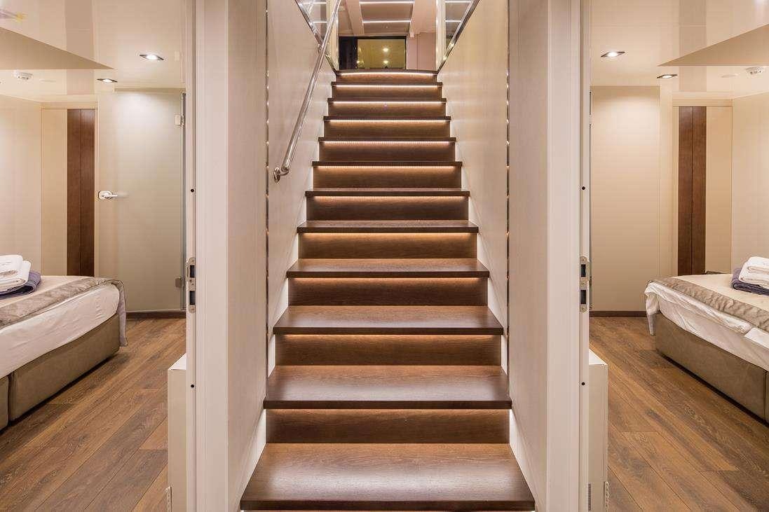 a staircase in a room aboard RARA AVIS Yacht for Charter