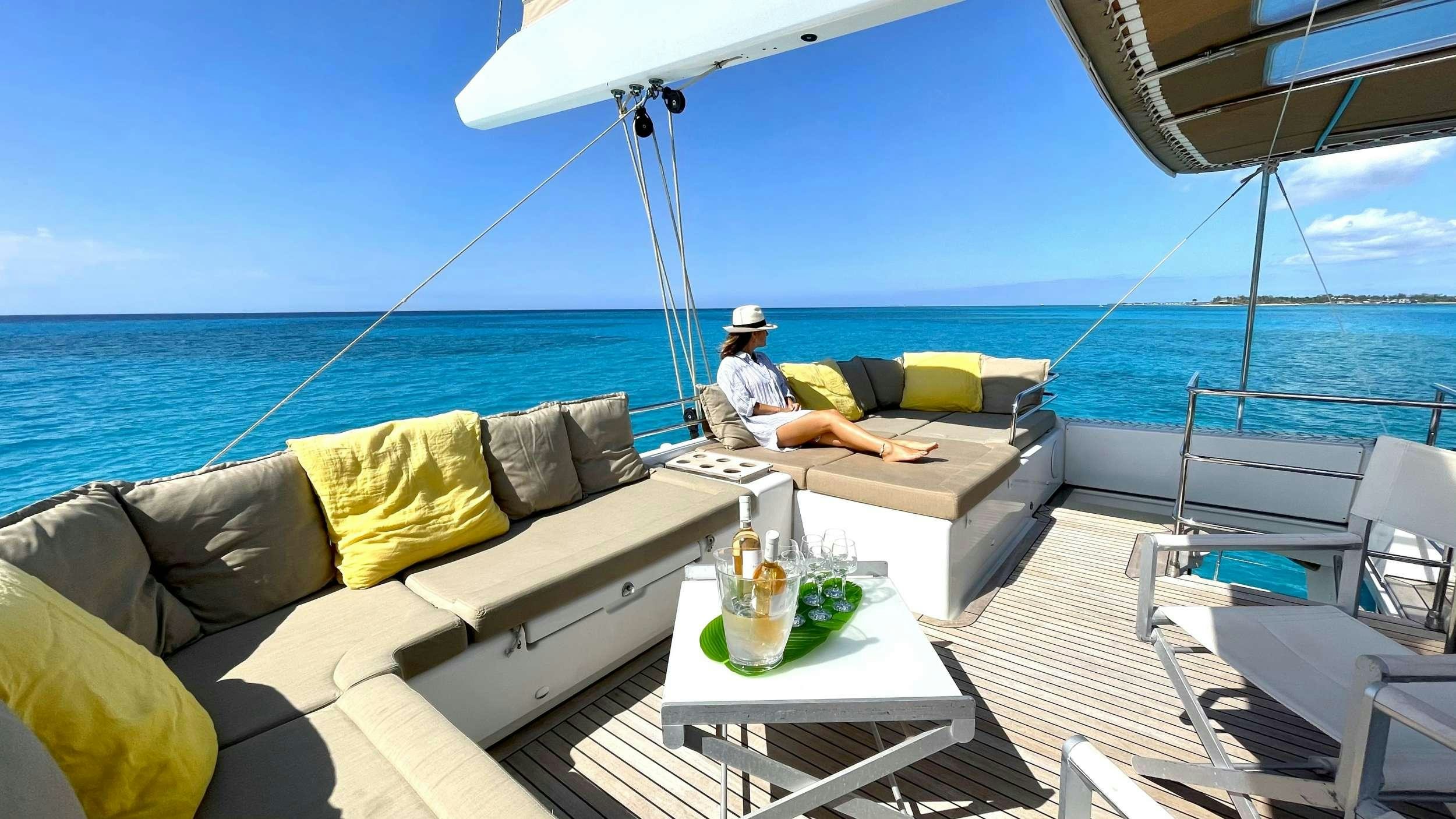 a person sitting on a boat aboard ZYLKENE 1 Yacht for Charter