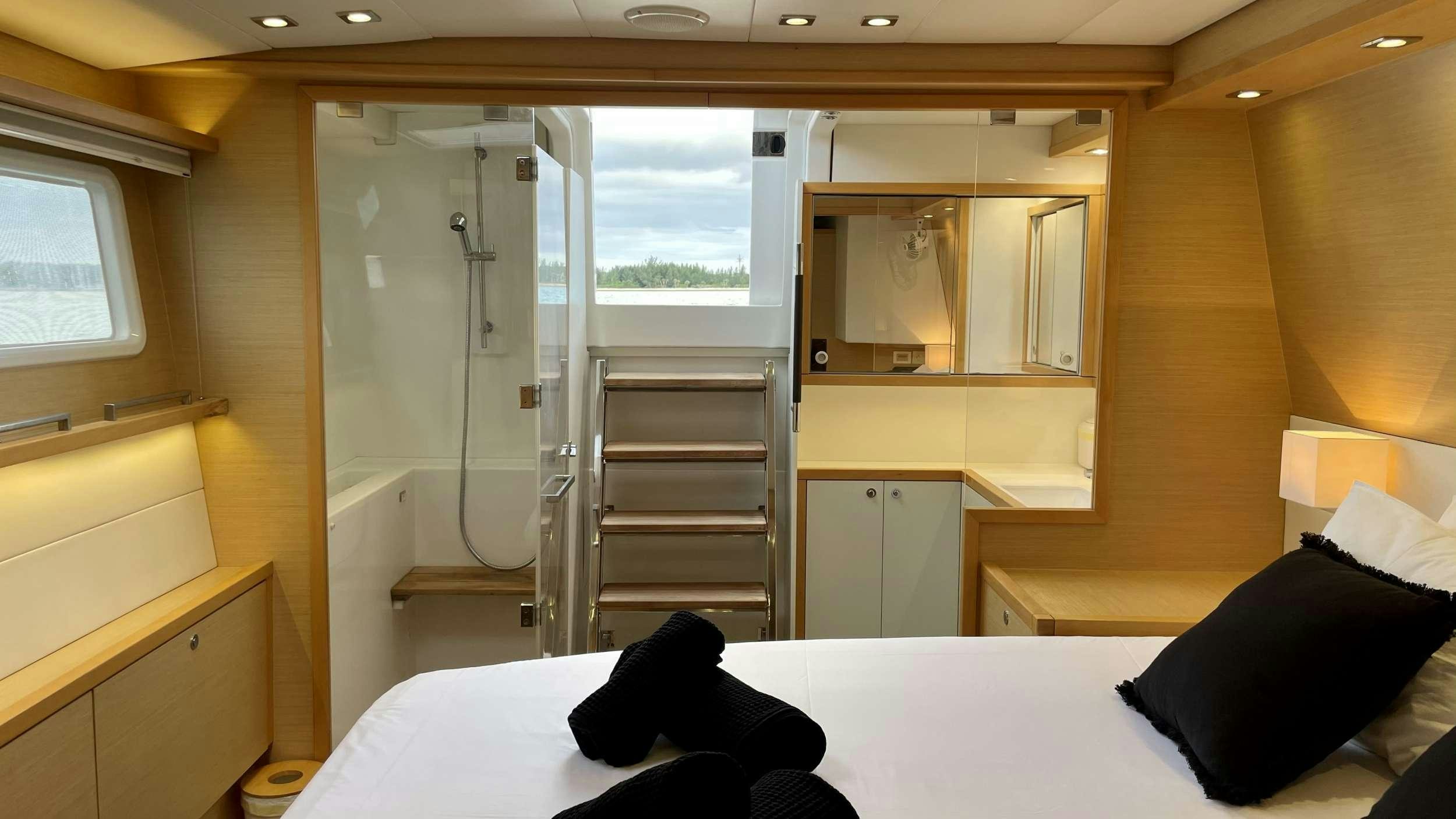 a room with a bed and a ladder aboard ZYLKENE 1 Yacht for Charter