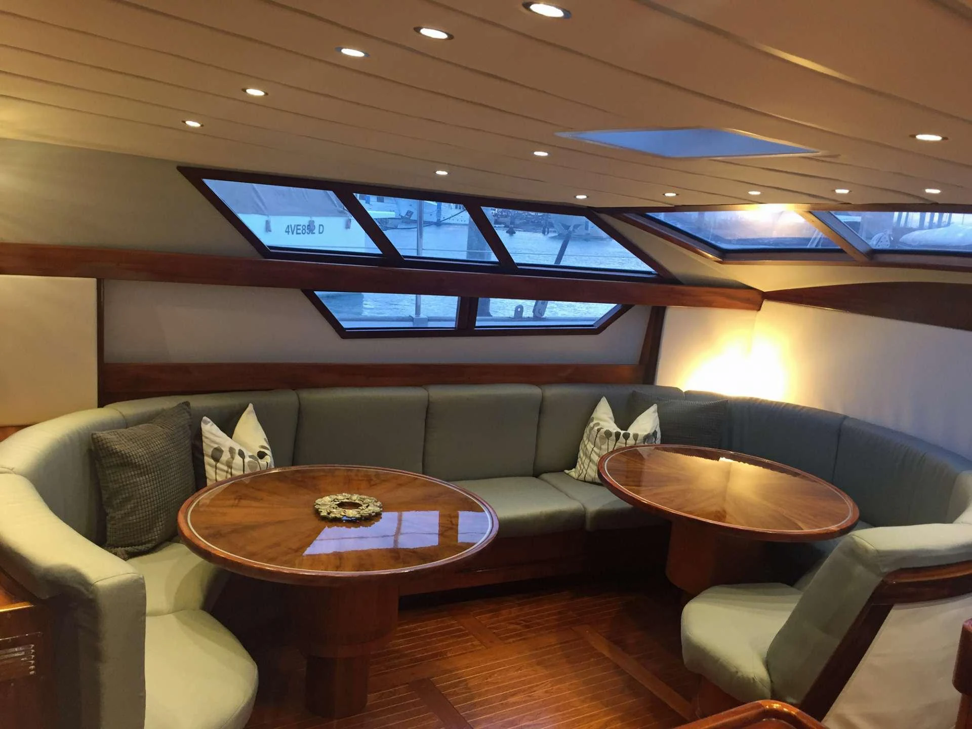 a room with couches and a table aboard Bellacha Yacht for Charter