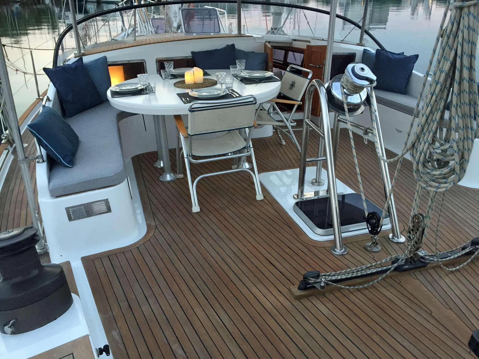 a living room with a table and chairs aboard Bellacha Yacht for Charter