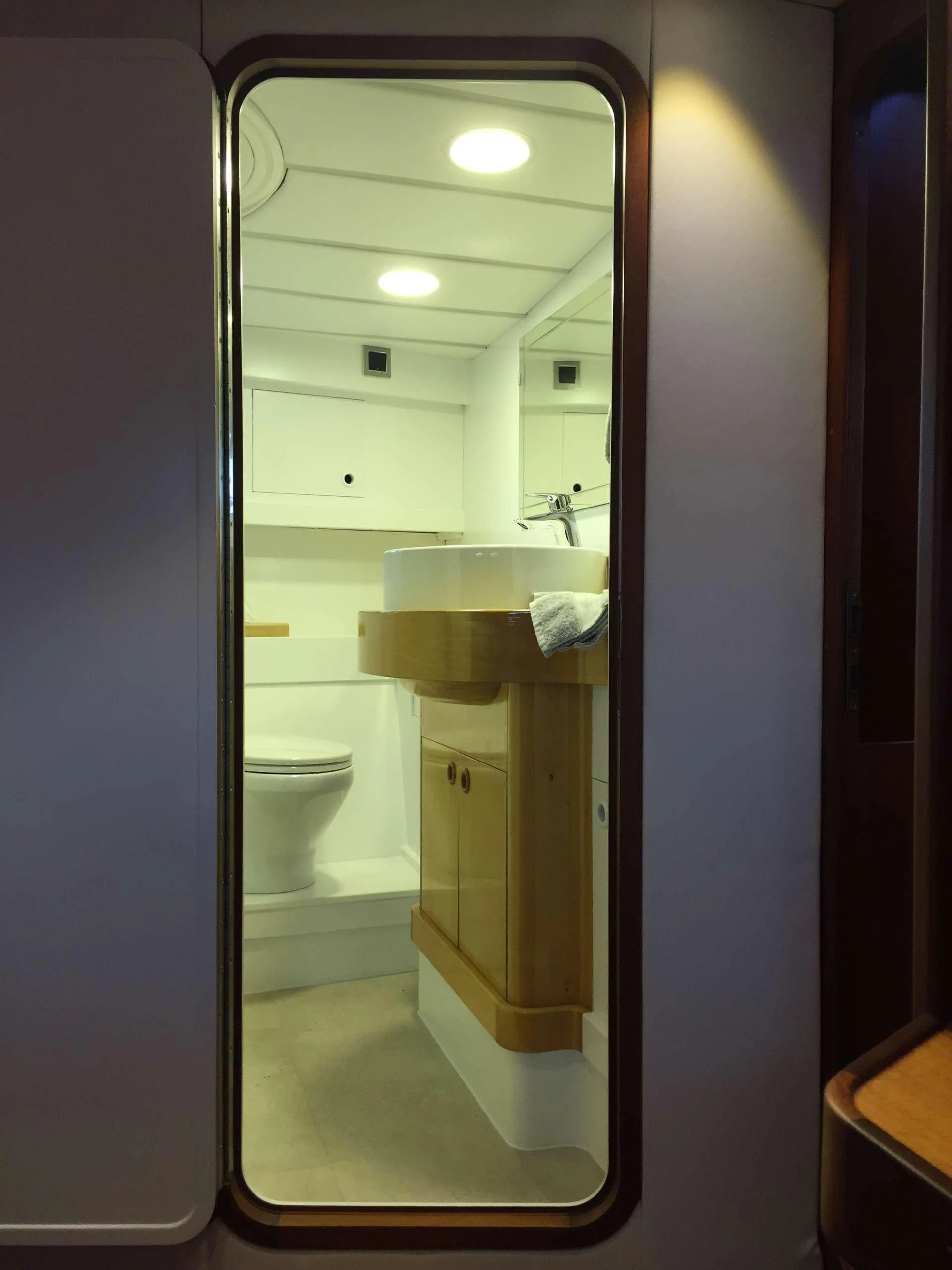 a bathroom with a sink and toilet aboard Bellacha Yacht for Charter