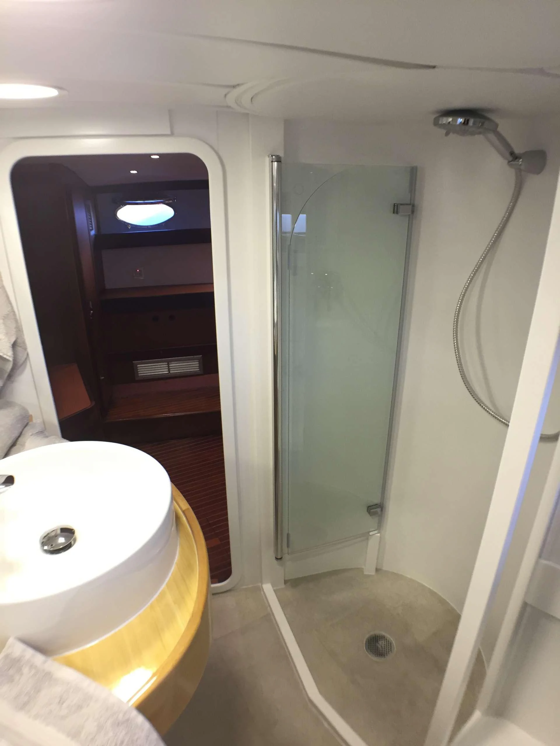a bathroom with a shower and sink aboard Bellacha Yacht for Charter