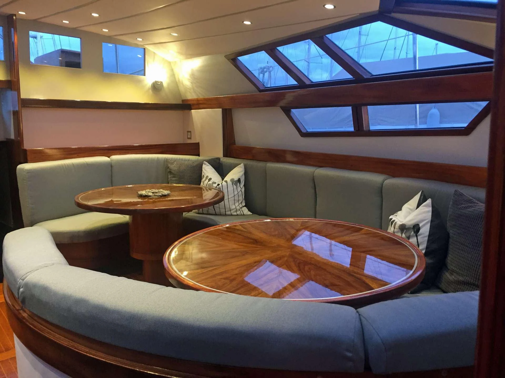 a couch and a table in a room aboard Bellacha Yacht for Charter