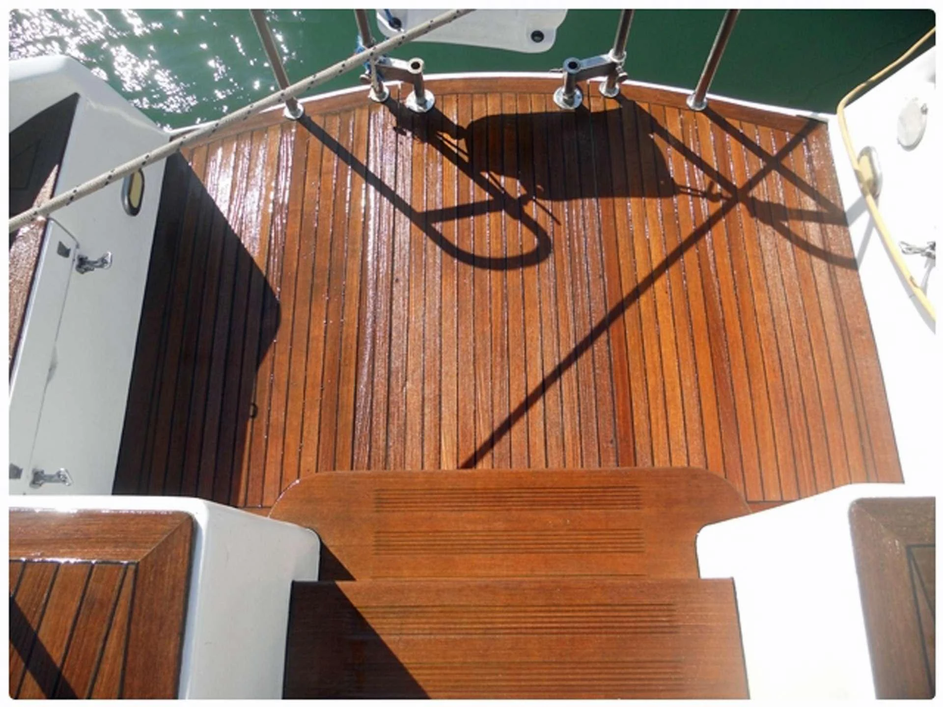 a bicycle on a wooden surface aboard Bellacha Yacht for Charter