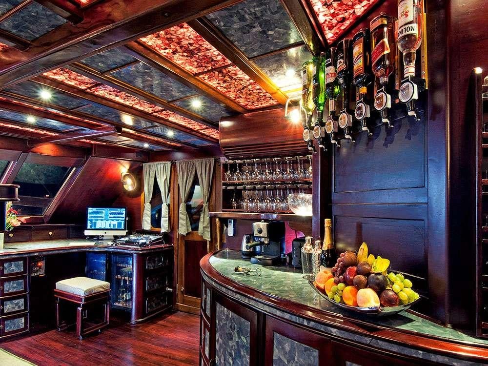 a kitchen with a table full of fruit aboard MANTAMAE Yacht for Charter