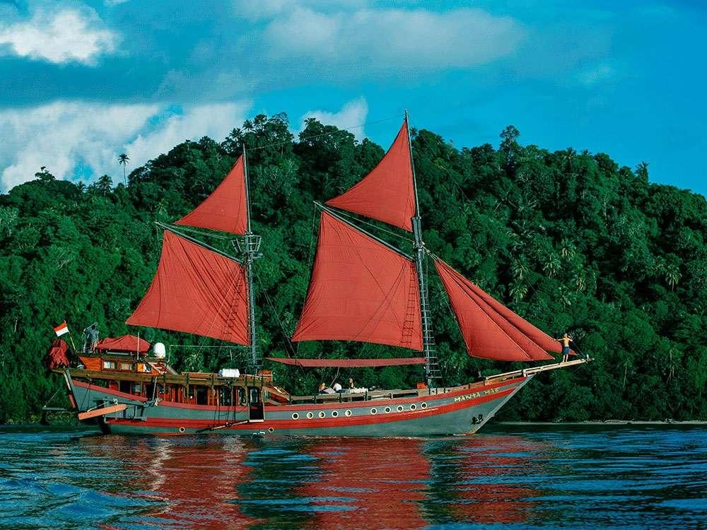 a few sailboats on the water aboard MANTAMAE Yacht for Charter