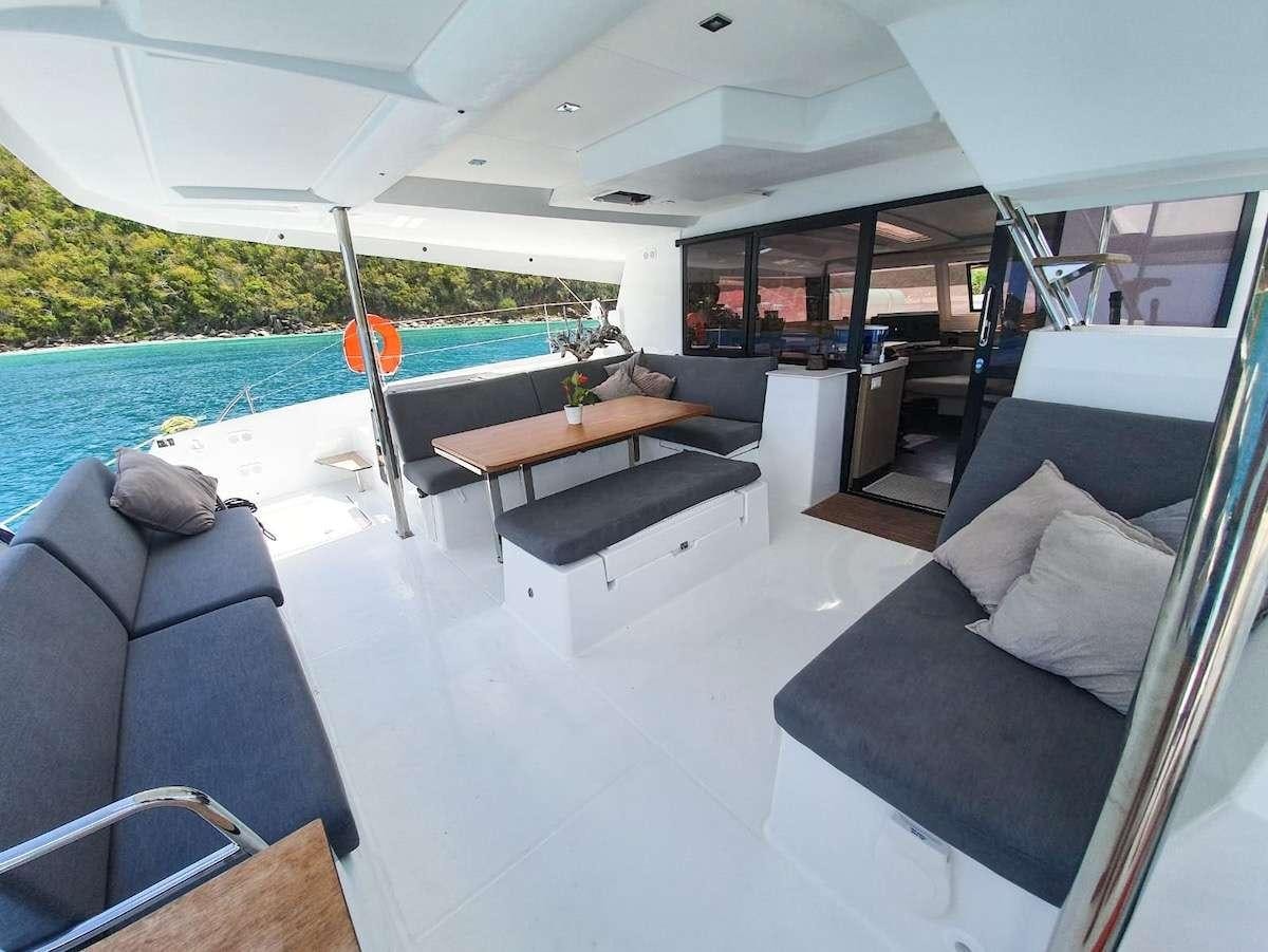 a living room with a pool aboard CHAMPS ELYSEES Yacht for Charter