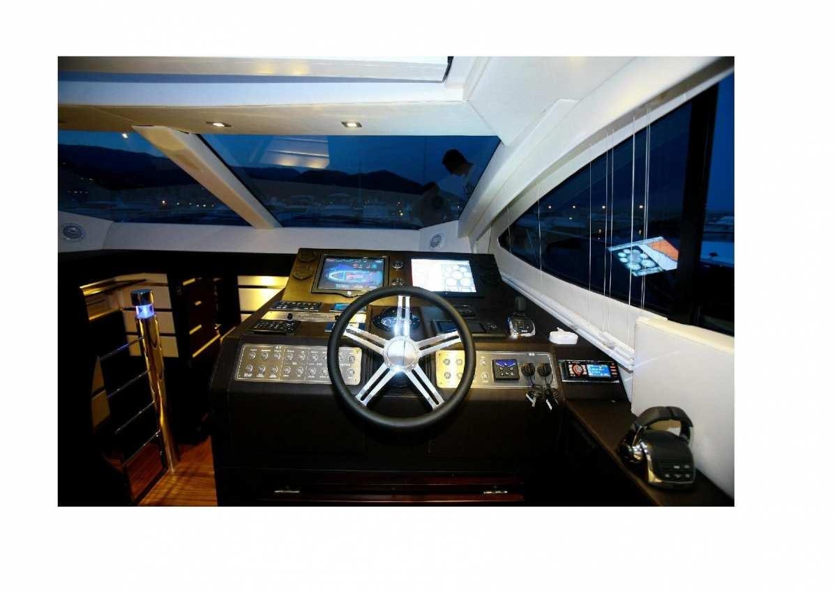 a computer monitor and a camera aboard DADDA Yacht for Charter
