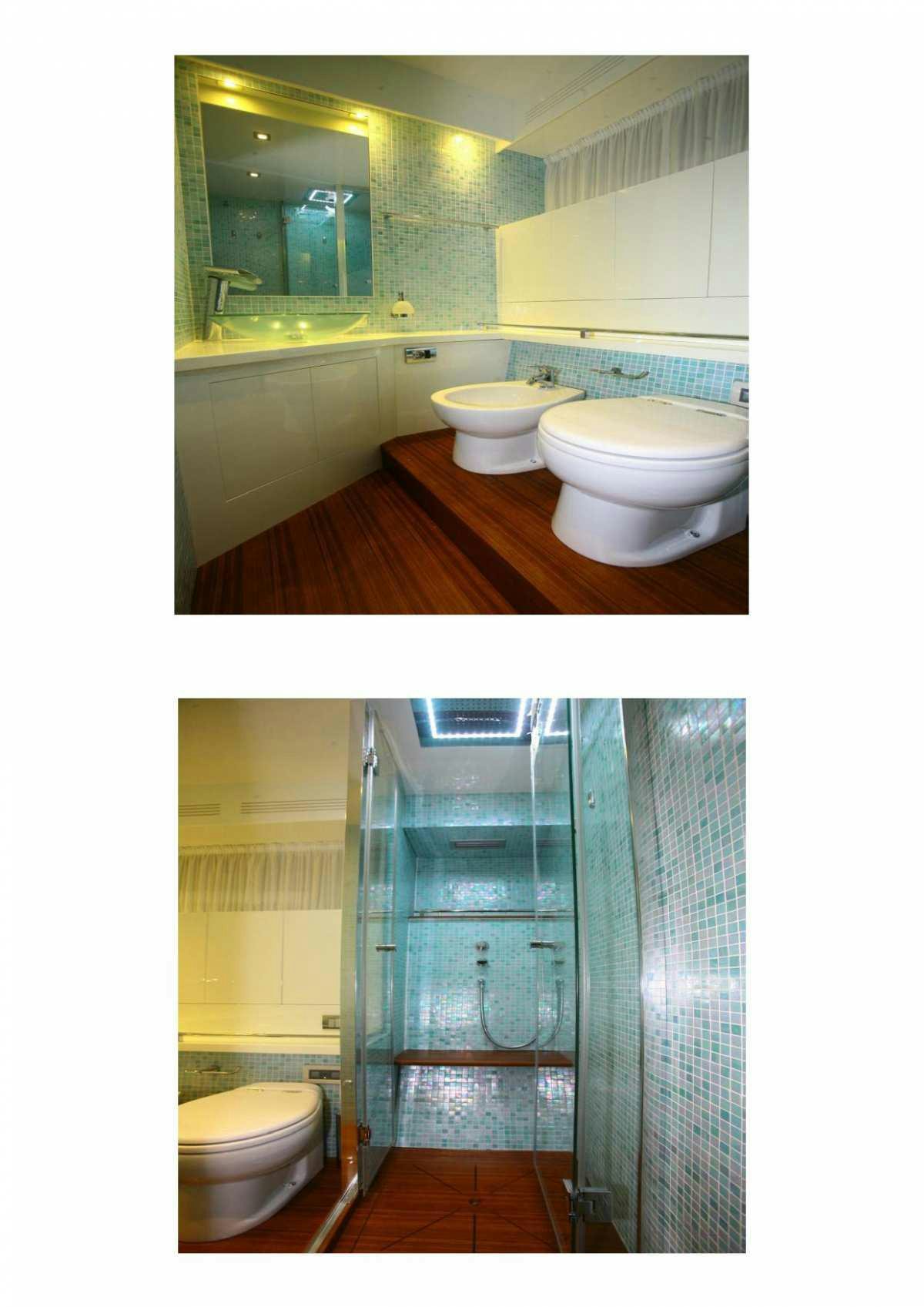 a bathroom with a glass shower aboard DADDA Yacht for Charter