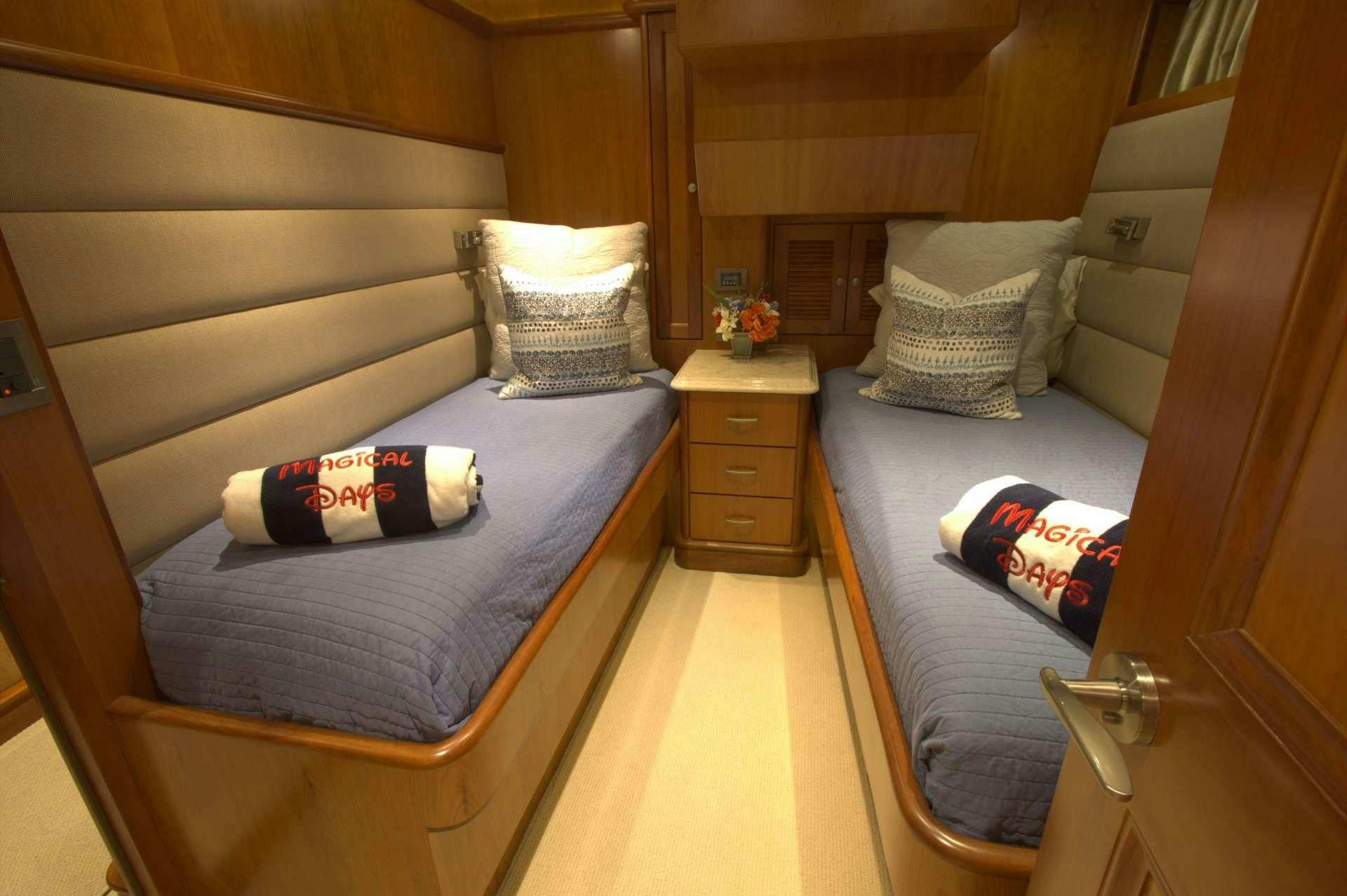 a room with two beds aboard MAGICAL DAYS Yacht for Charter
