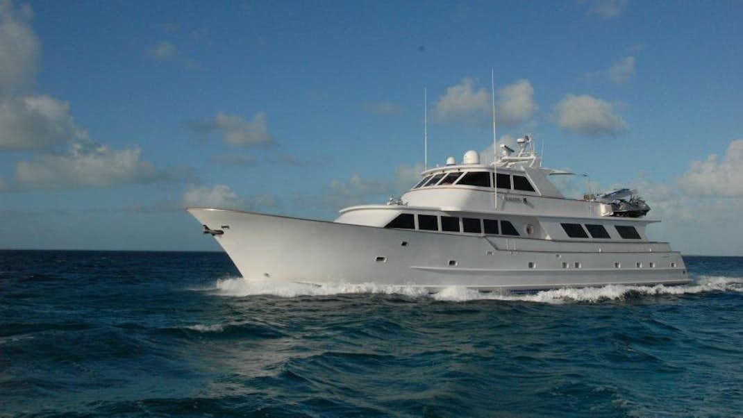 a white yacht in the water aboard KALEEN Yacht for Charter