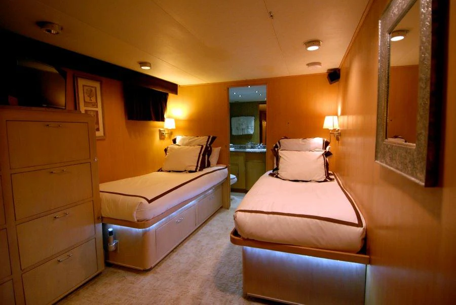 a room with two beds aboard KALEEN Yacht for Charter